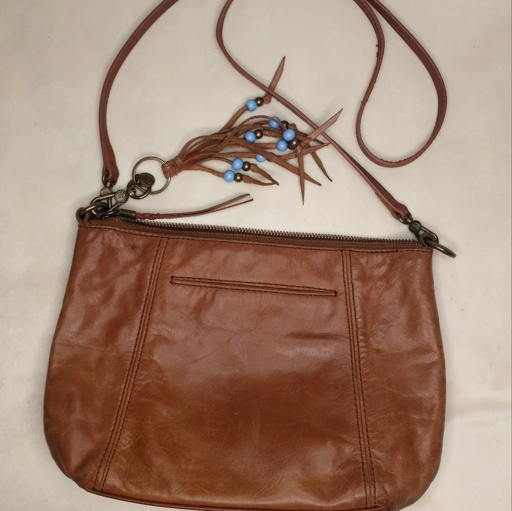 The Sak Leather Floral Paisley Tooled Bohemian Western Bag With Fringe Bead Tag